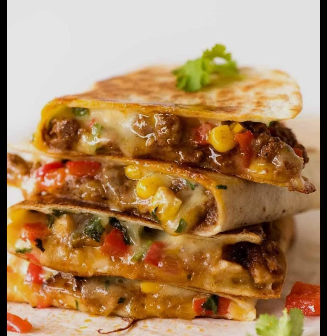 Gigi's portion — loaded, saucy, served hot.